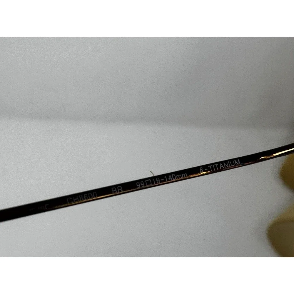 Charmant CH8600 BR Beta Titanium Brown Rimless Eyeglass Frames 140mm Authentic